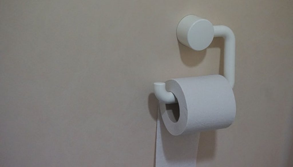toilet paper storage ideas working well in this small bathroom